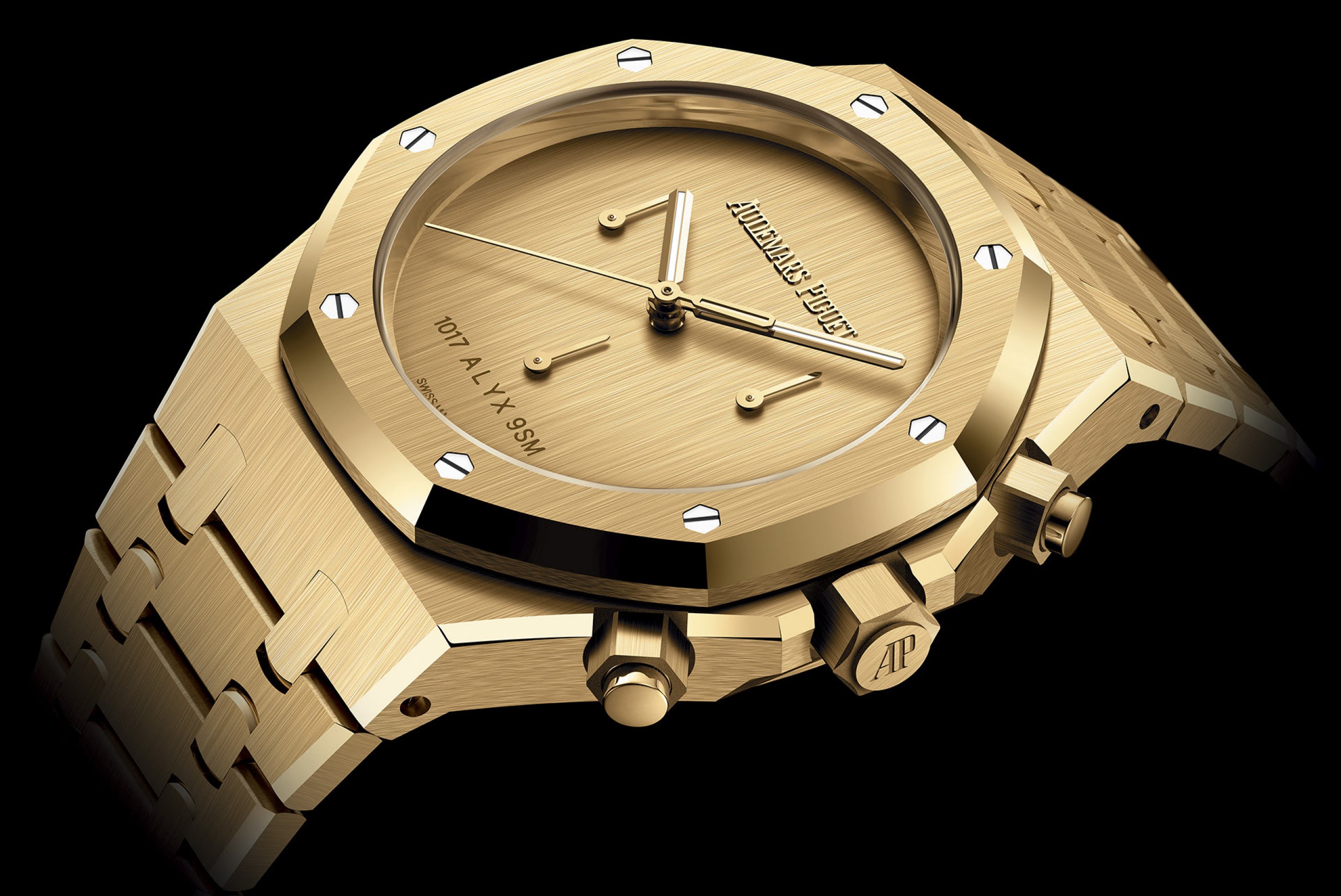 A gold Royal Oak Chronograph watch.