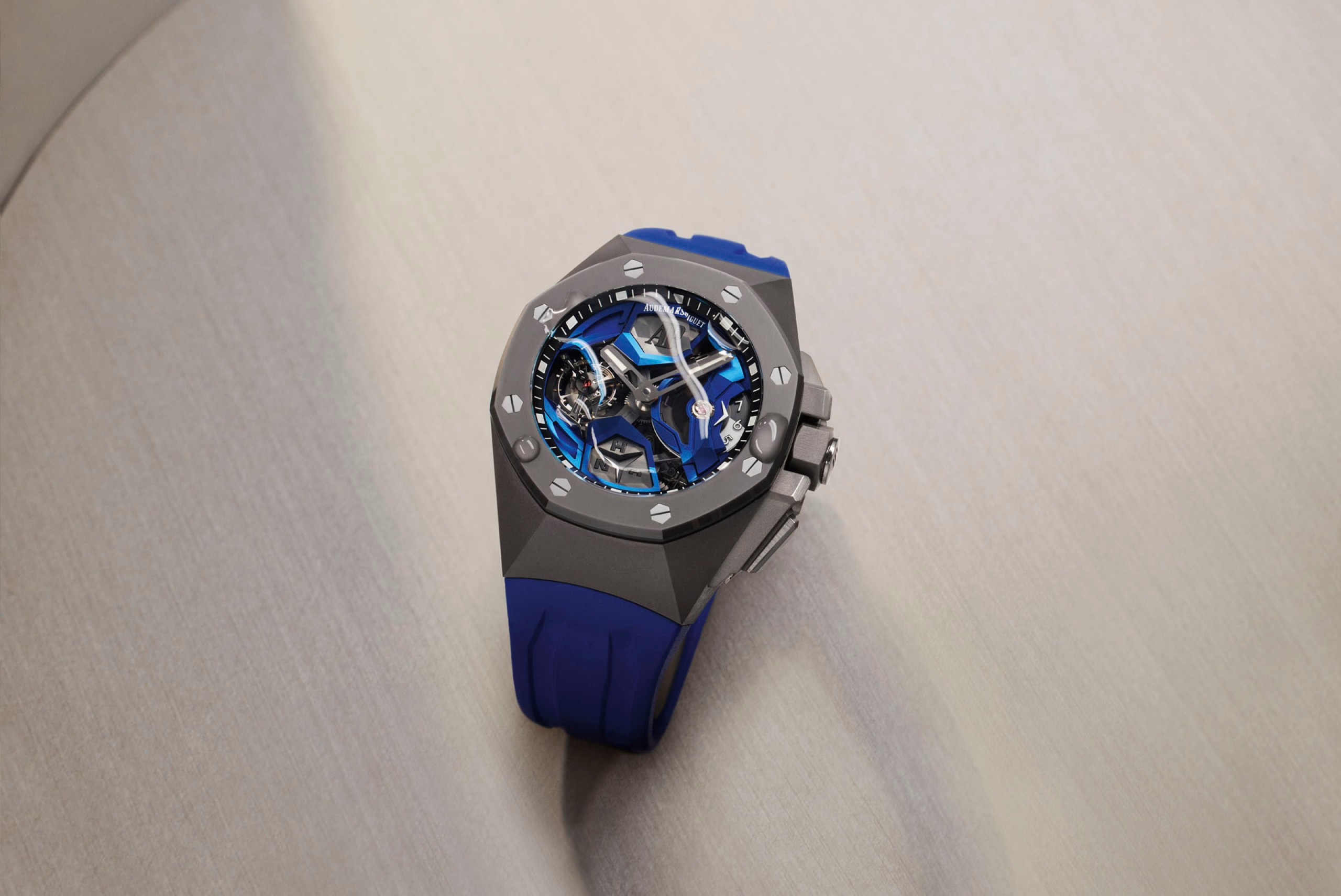 Someone cleaning a Royal Oak watch.