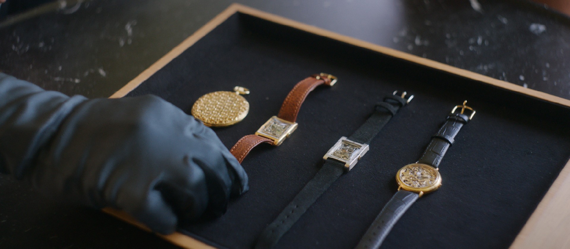 Openworked watches in the hands of an expert.